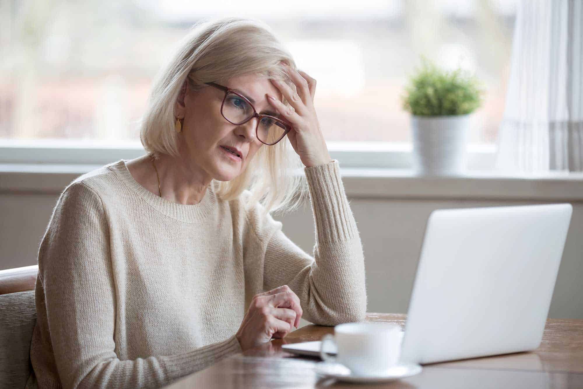overwhelmed-woman-at-computer